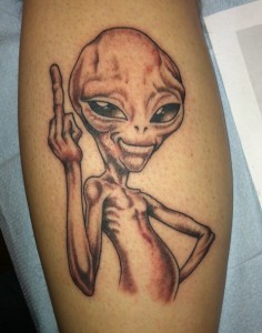 Amazing Grey Alien Tattoo On Leg
