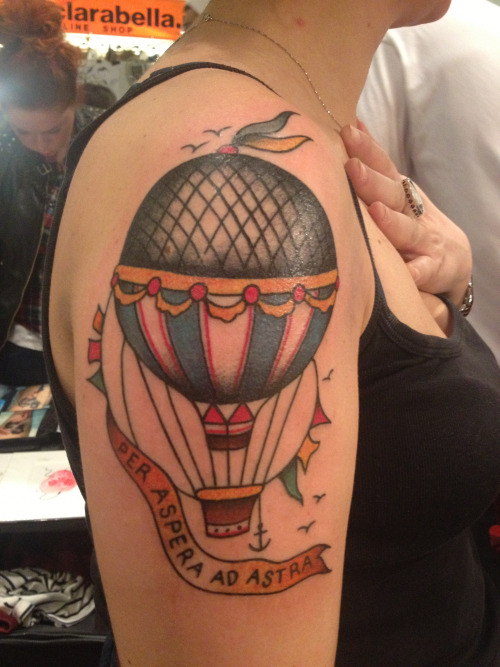 Amazing Hot Air Balloon With Banner Tattoo On Girl Right Shoulder