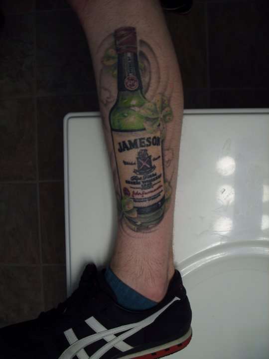 Amazing Jameson Bottle Tattoo On Leg