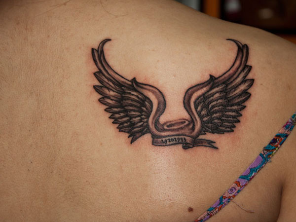 Beautiful Small Angel Wings Tattoo on Girl's Back Shoulder