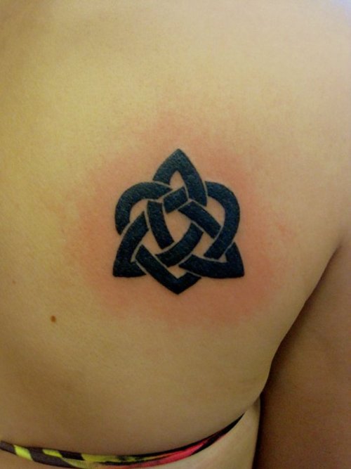 Black Celtic Knot Tattoo On Girl Right Back Shoulder