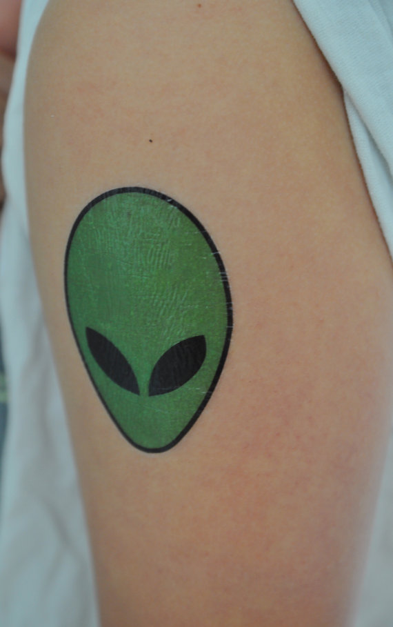 Black Eyes Green Alien Tattoo On Arm