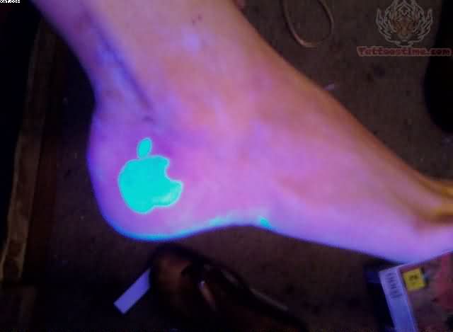 Blacklight Apple Logo Tattoo On Heel By SonnieMarie