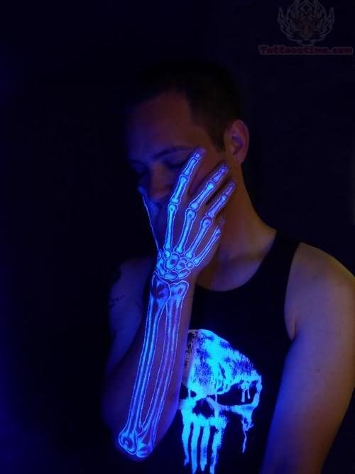 Blacklight Skeleton Hand Tattoo On Man Hand
