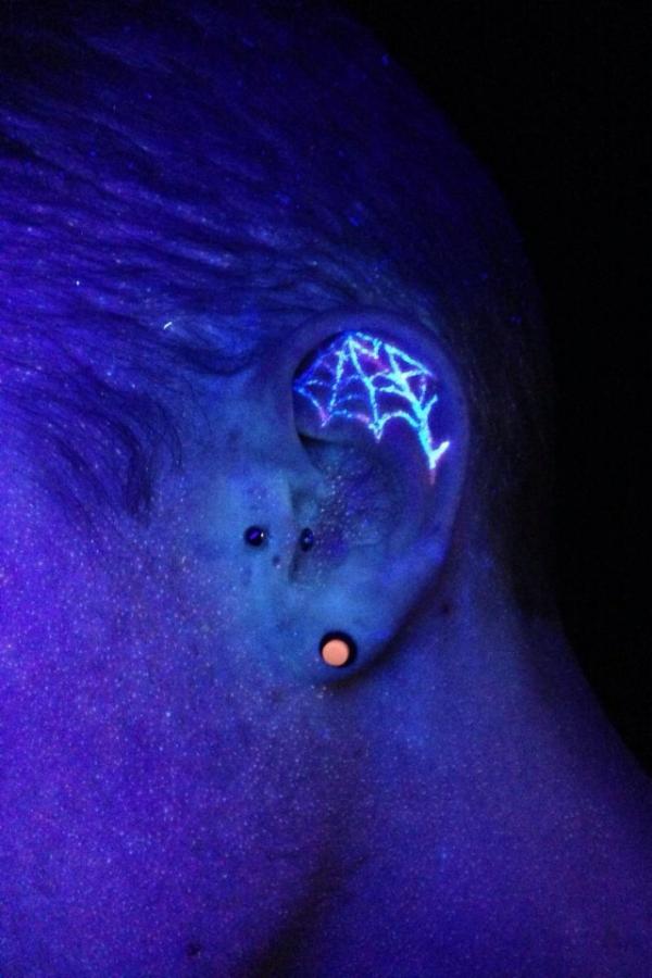 Blacklight Spider Web Tattoo On Inside Ear