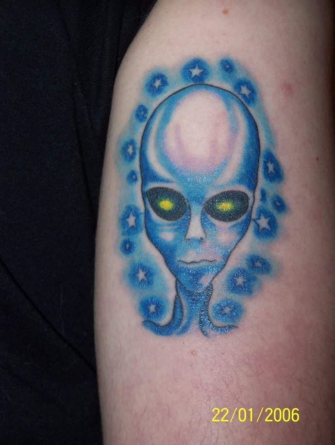 Blue Ink And Shining Eyes Alien Head Tattoo