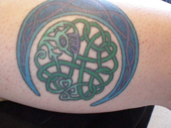 Blue Moon And Green Celtic Knot Tattoo On Bicep
