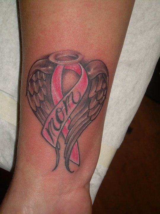 Breast Cancer With Angel Wings Tattoo On Leg