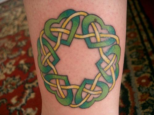 Celtic Knot Green Hearts Tattoo On Bicep