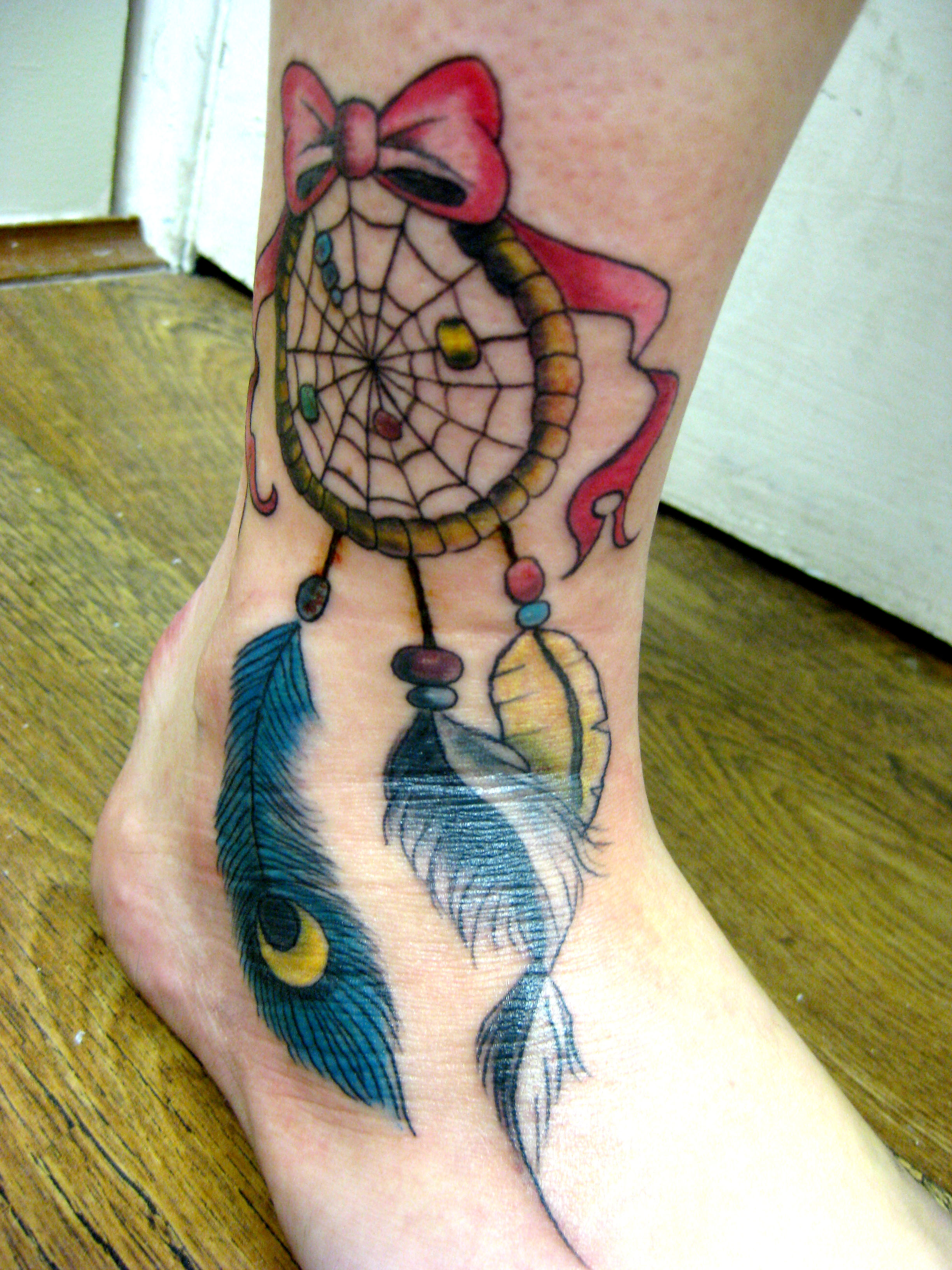 Colorful Dreamcatcher Tattoo On Girl Right Foot