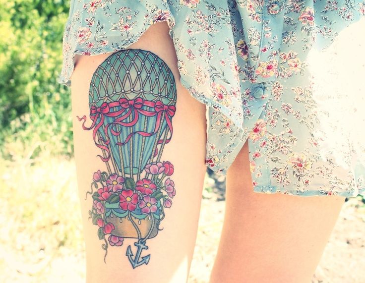 Colorful Hot Air Balloon With Flowers And Anchor Tattoo On Girl Thigh