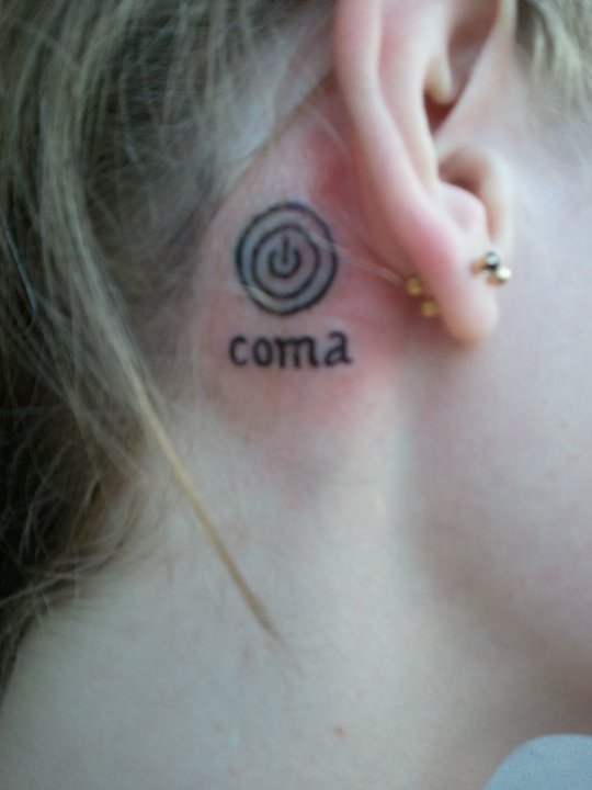 Coma - Power Button Tattoo On Girl Behind The Ear By Rebecca Anne Bakels