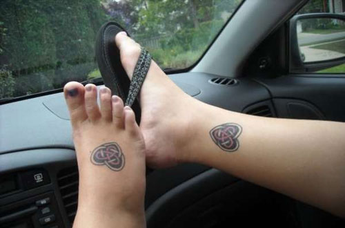 Couple With Celtic Knot Love Tattoos