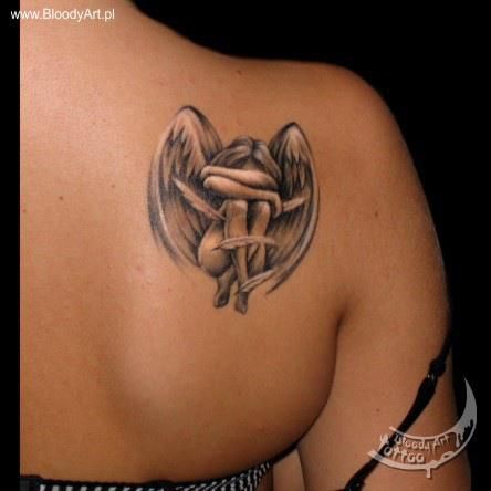 Crying Small Fallen Angel tattoo on back shoulder