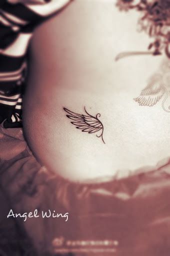 Cute angel wings tattoo on hip for girls