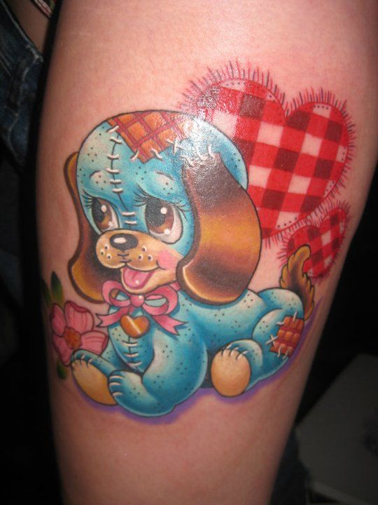 Cute colorful cartoon puppy tattoo on arm