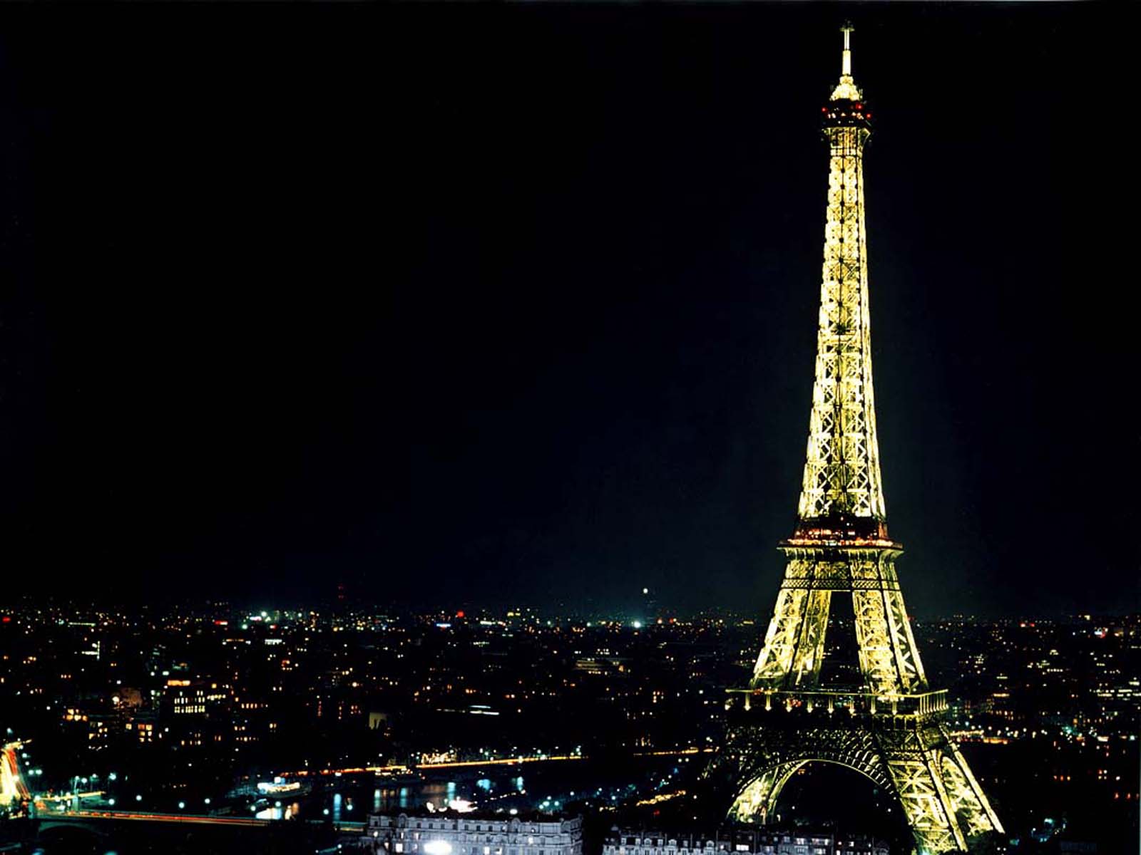 Eiffel Tower and Paris, France at night