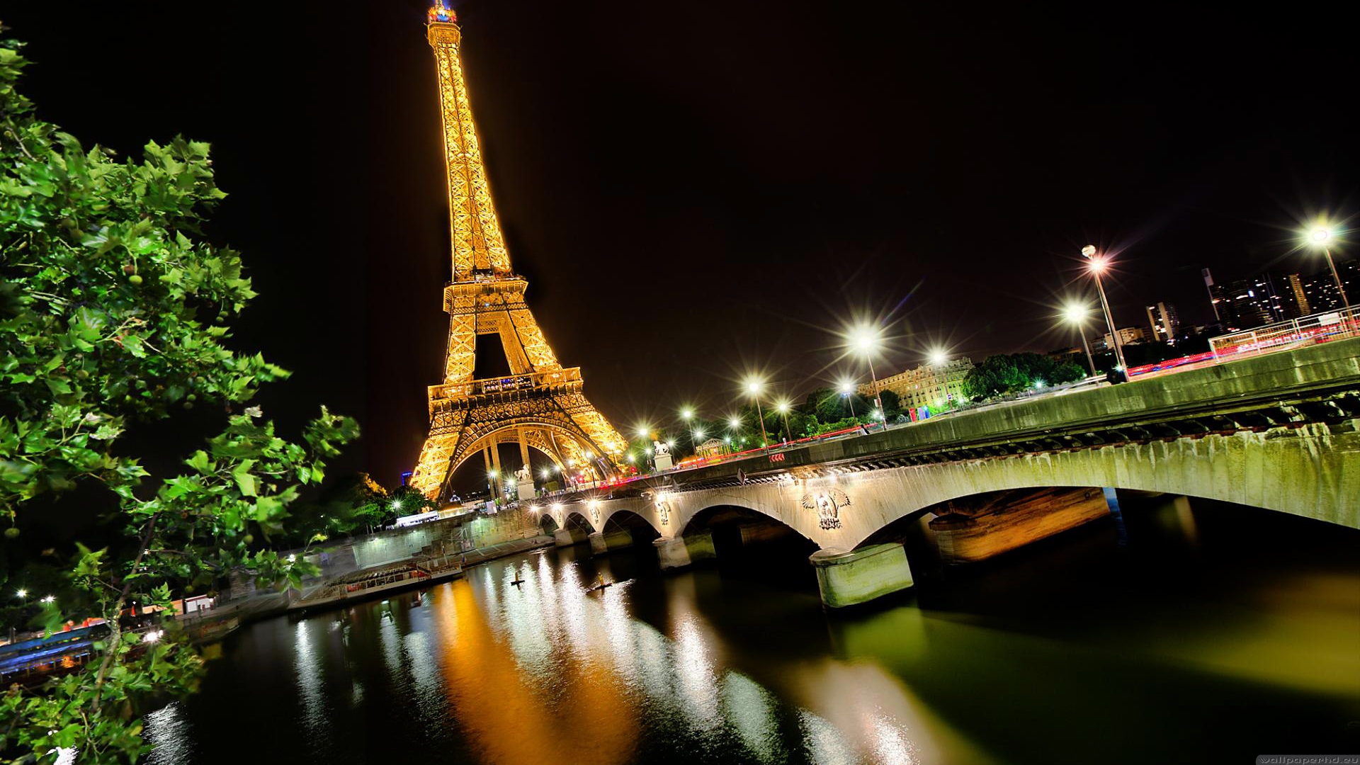 Eiffel tower and Seine river at night