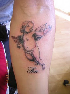 Flying Baby Angel Tattoo On Forearm