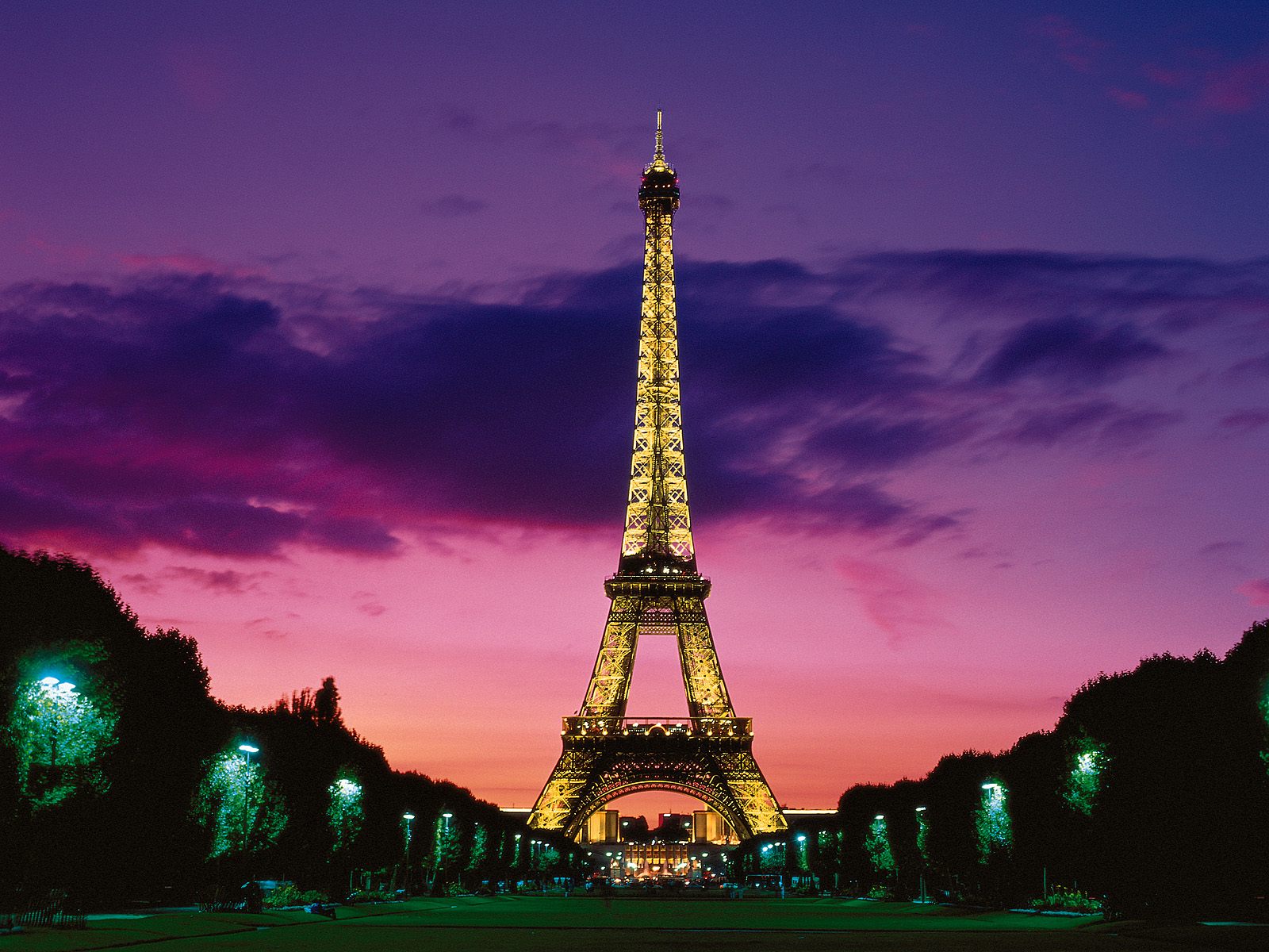 Full front view of Eiffel tower at night