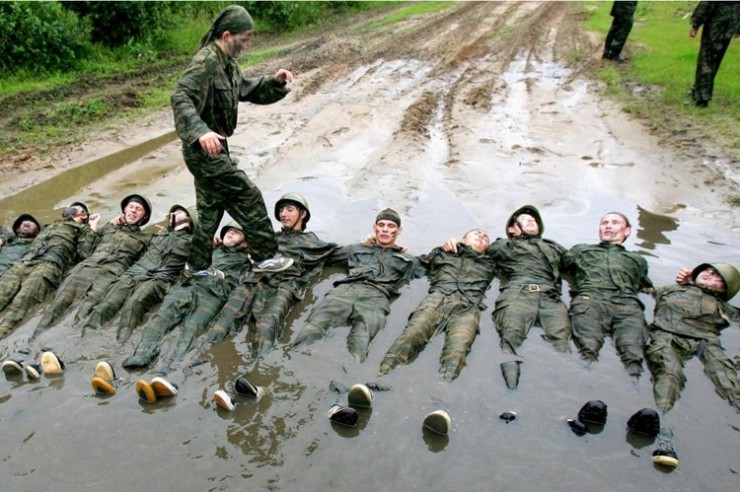 Girl Crossing Mud Over Military Men Funny Picture