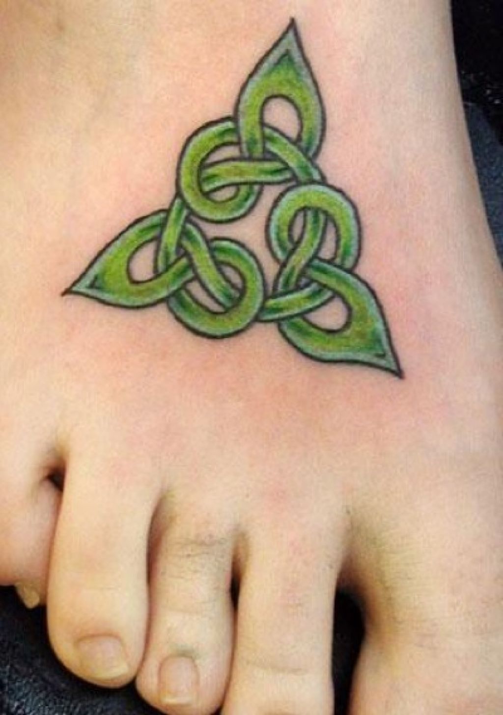 Green Celtic Knot Tattoo On Right Foot