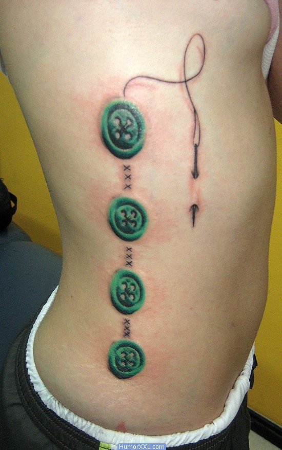 Green Ink Four Button With Needle Tattoo On Side Rib