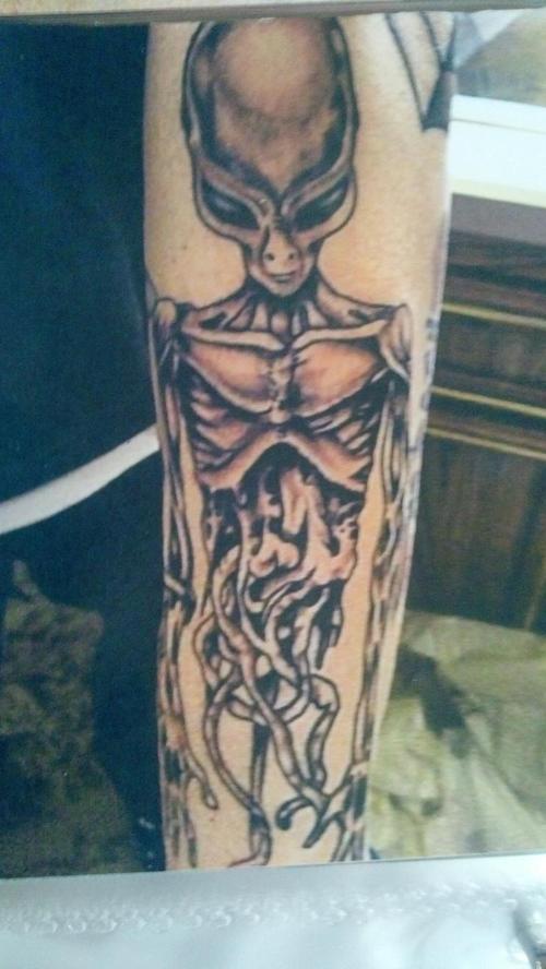 Grey Alien Skeleton Tattoo On Arm