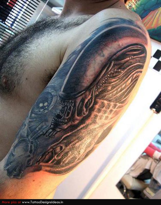 Grey Ink Ancient Alien Tattoo On Shoulder For Men