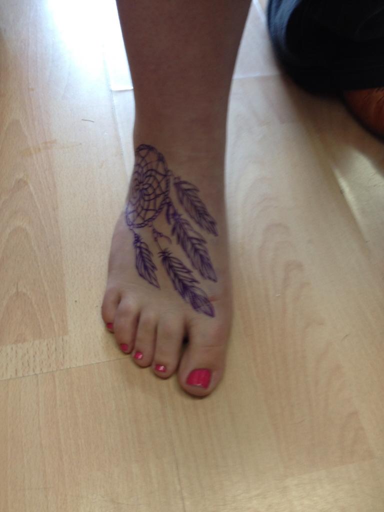 Grey Ink Dreamcatcher Tattoo On Girl Right Foot