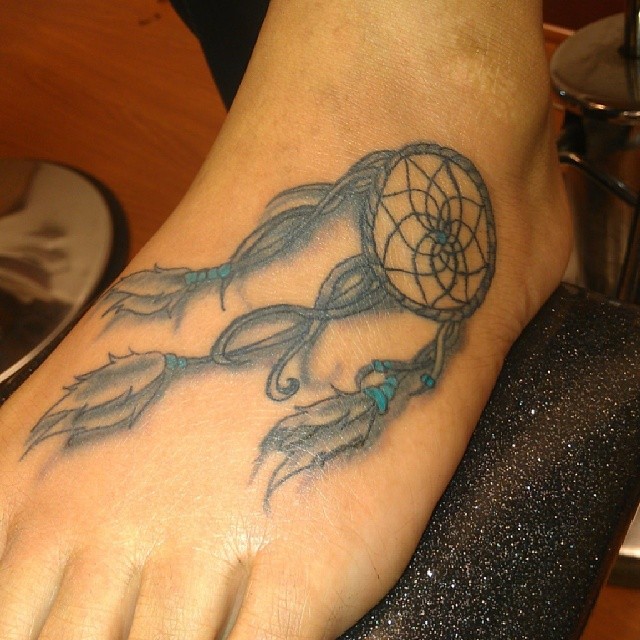Grey Ink Dreamcatcher Tattoo On Left Foot For Girls