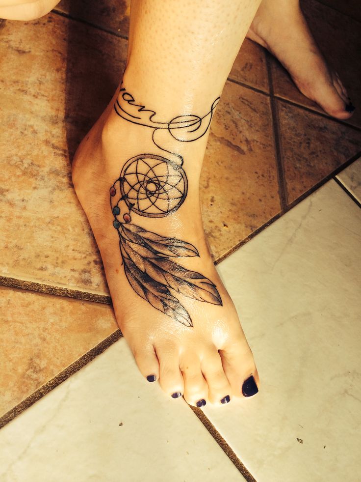Grey Ink Dreamcatcher Tattoo On Right Foot