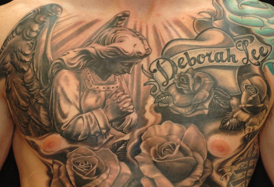 Grey Rose Flowers And Praying Angel Tattoo On Man Chest