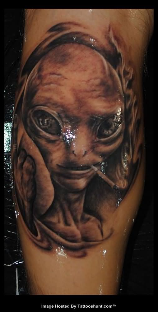 Grey Smoking Alien Tattoo On Leg