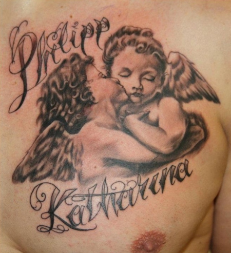 Kissing Baby Angels Tattoo On Man Chest