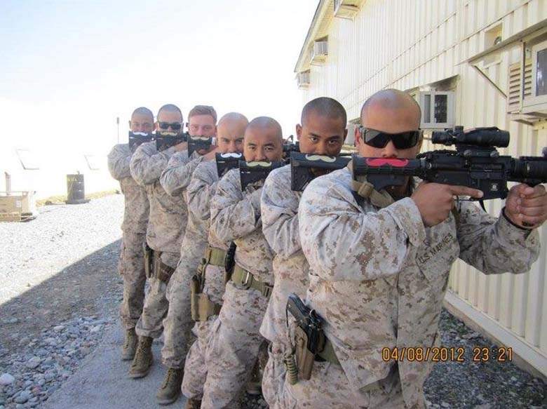 Military Men With Guns Funny Pose