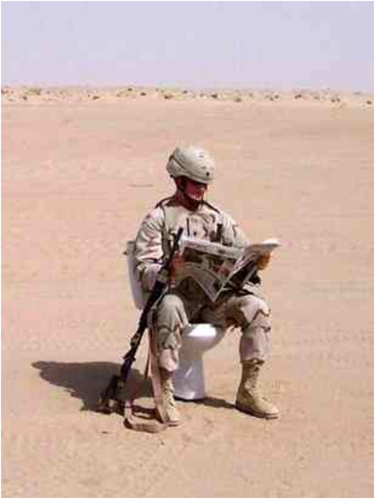 Military Reading Newspaper On Seat Funny Picture