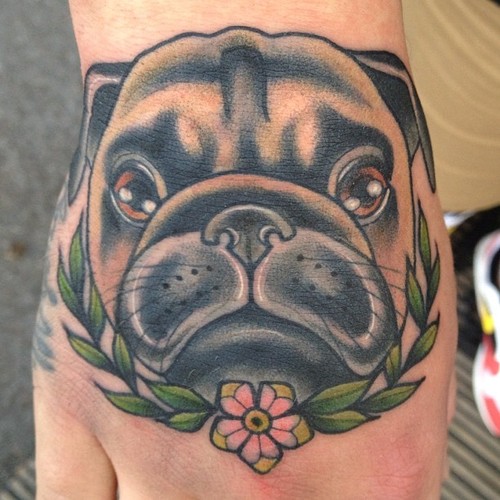 Realistic Puppy Face Tattoo on Hand