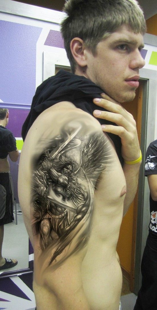 Realistic Warrior Angel Tattoo On Guy Right Half Sleeve