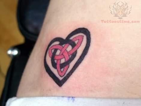 Red And Black Celtic Love Tattoo On Lower Back