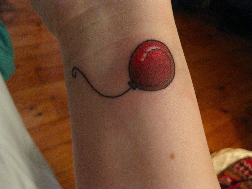 Red Balloon Tattoo On Wrist