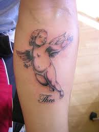 Small Baby Angel Tattoo on Forearm