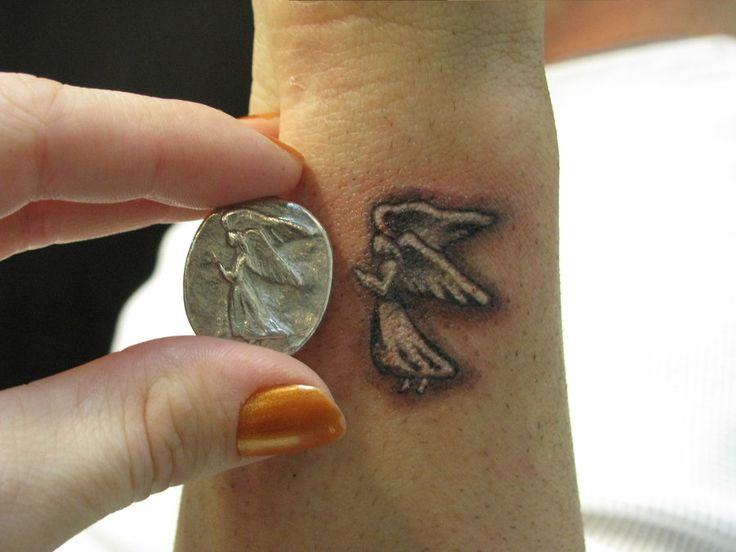 Small Flying Angel Tattoo on Wrist
