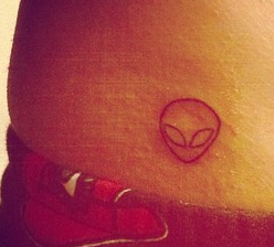Small Outline Alien Head Tattoo On Right Hip