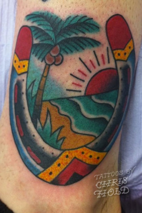 Traditional Beach View In Horse Shoe Tattoo Design By Chris Hold