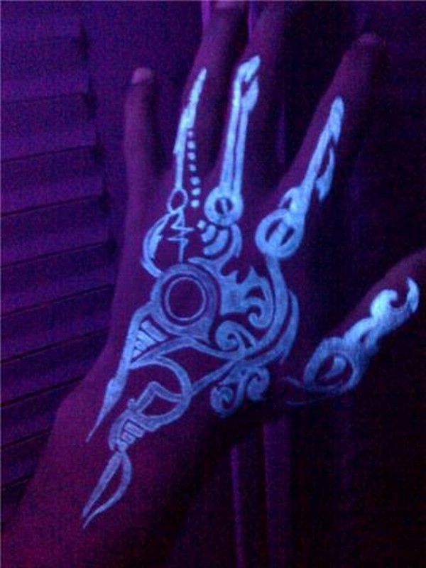 Unique Blacklight Skeleton Hand Tattoo On Hand