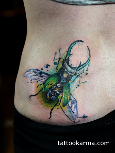 Watercolor Beetle Tattoo On Girl Side Rib