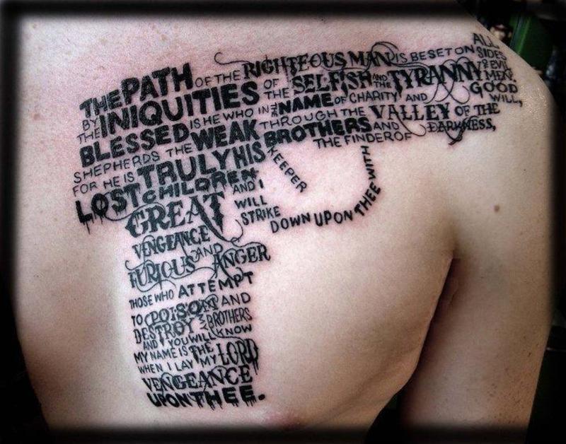 Amazing Bible Quote Gun Tattoo On Man Left Front Shoulder