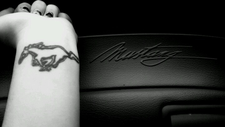 Amazing Black Outline Mustang Tattoo On Girl Wrist