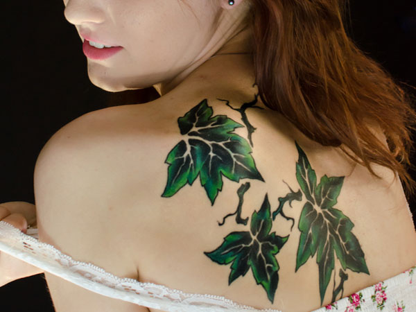 Amazing Green Leaf Tattoo On Upper Back